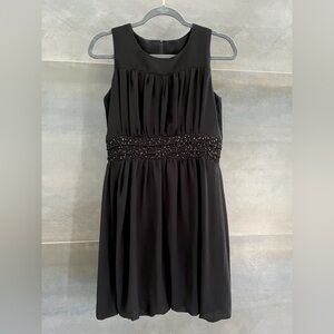 MOPLE Black Balloon Chiffon Dress with Subtle Gold Spangle Waist Detail